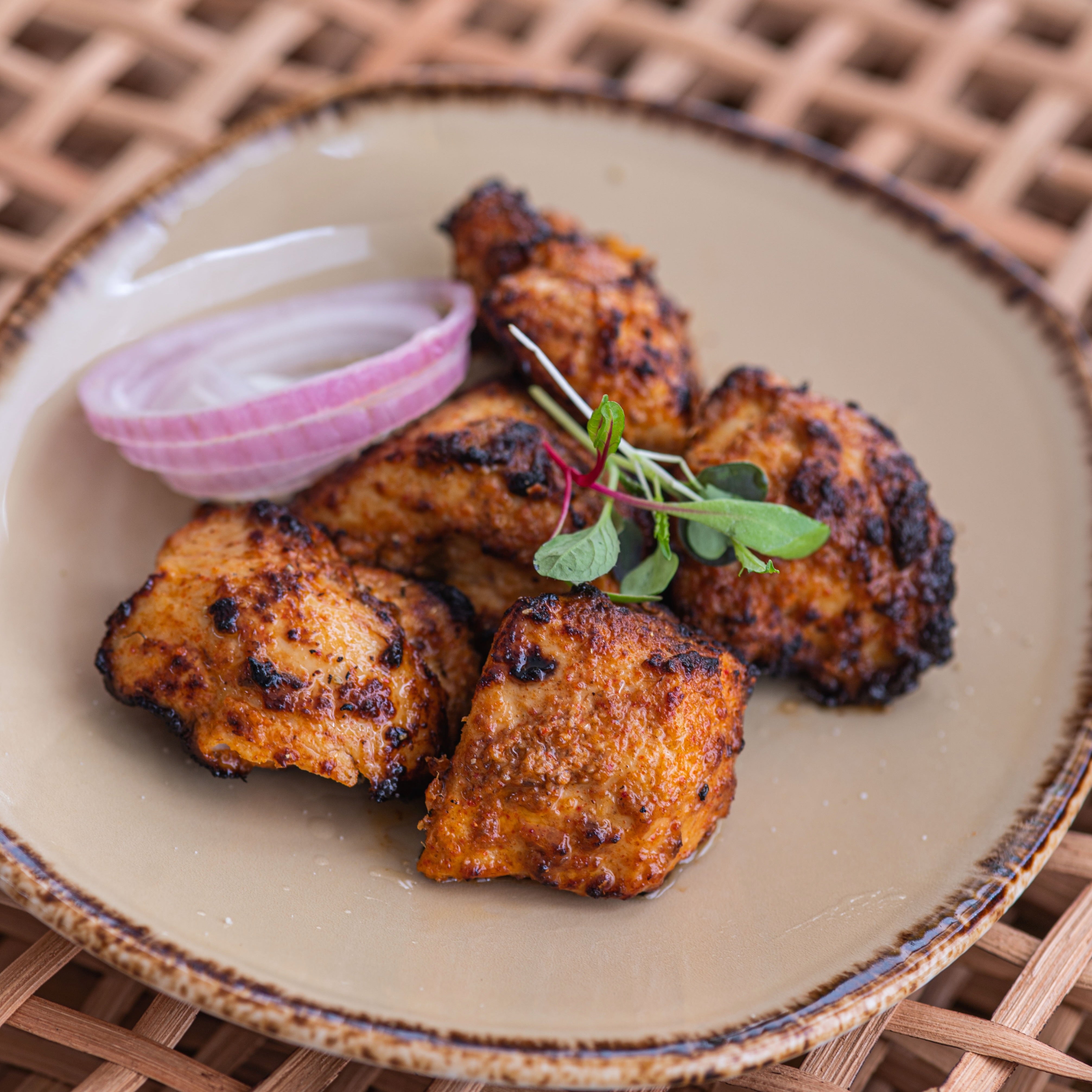 Achari Chicken tikka (contains Gluten, dairy, mustard, sesame seed)